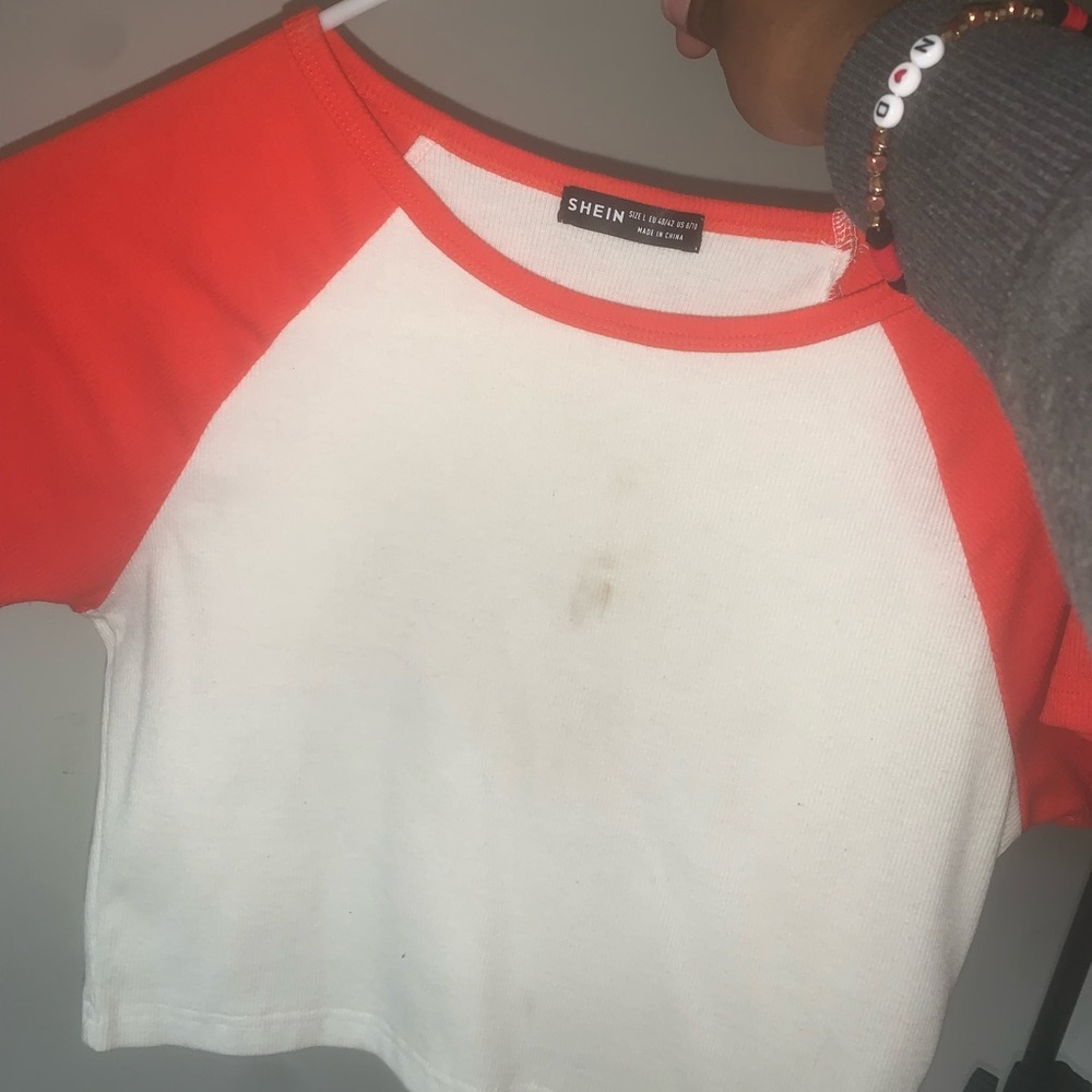 white and red cropped shirt, from shein, small stain on the front as u can see.